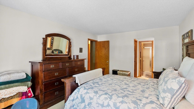 2606 Lake Court Dr, Mounds View, MN 55112 - carpeted bedroom with a textured ceiling