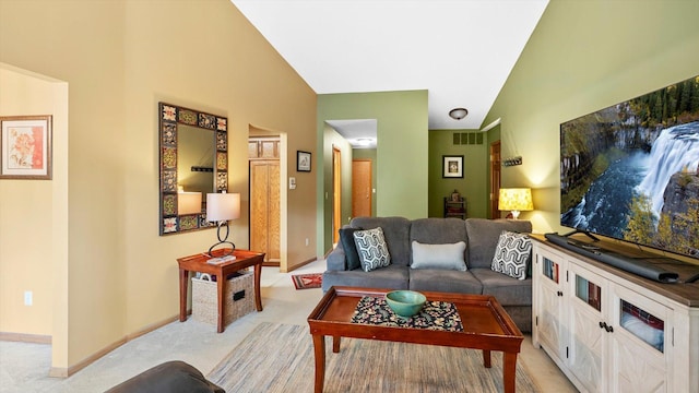 2606 Lake Court Dr, Mounds View, MN 55112 - living room with light carpet, baseboards, and high vaulted ceiling