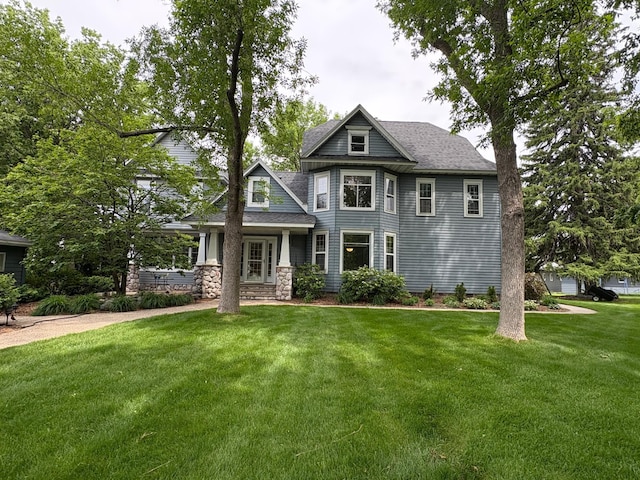 1710 Maple Ave, Benson, MN 56215 - view of front of house with a front yard and roof with shingles