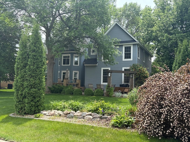 1710 Maple Ave, Benson, MN 56215 - view of front facade featuring a front yard, a pergola, and a deck