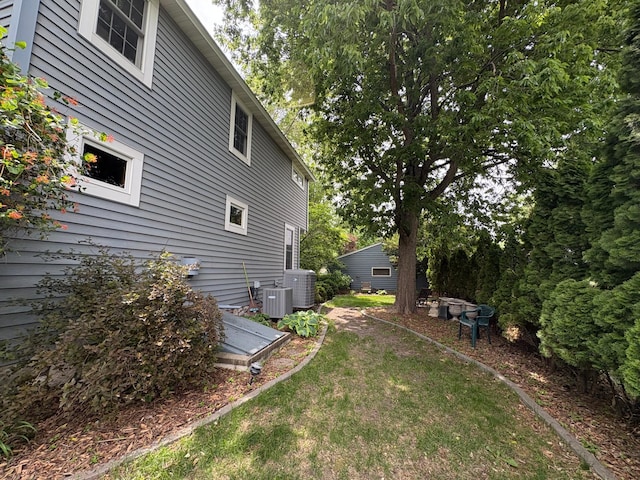1710 Maple Ave, Benson, MN 56215 - view of grassy yard with cooling unit