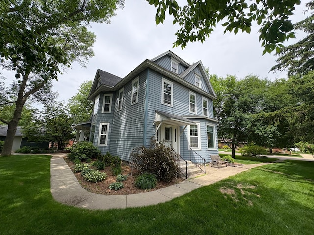 1710 Maple Ave, Benson, MN 56215 - view of side of property with a lawn