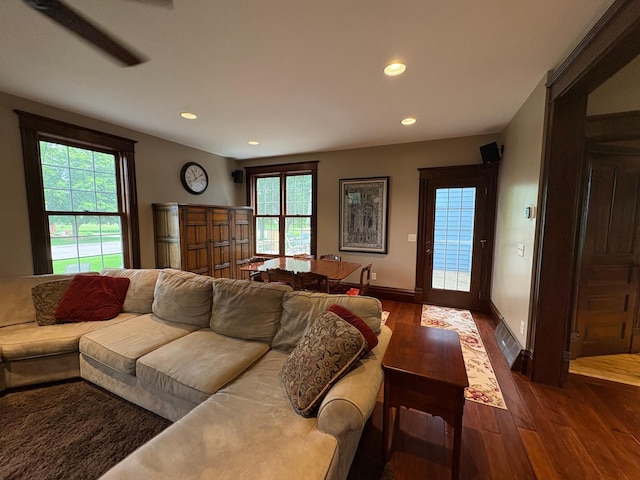 1710 Maple Ave, Benson, MN 56215 - living room featuring dark wood-style flooring, recessed lighting, and baseboards