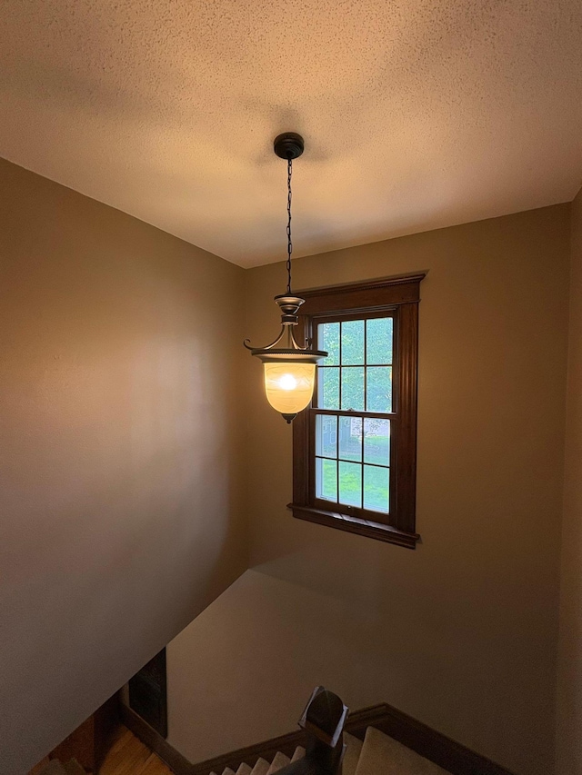 1710 Maple Ave, Benson, MN 56215 - detailed view of a textured ceiling and baseboards