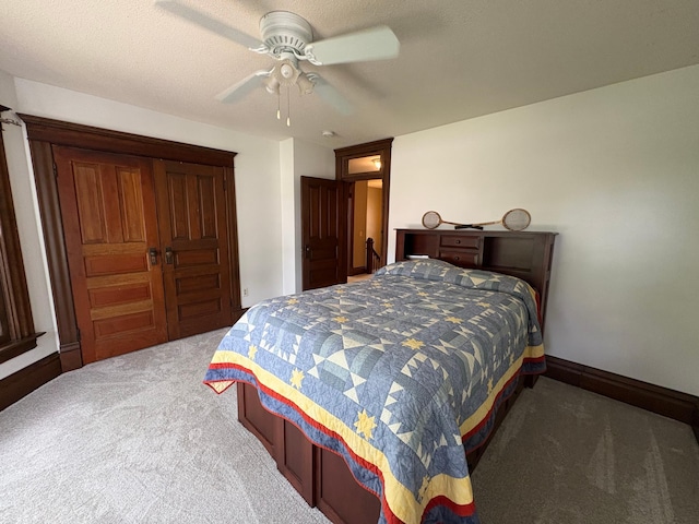 1710 Maple Ave, Benson, MN 56215 - bedroom featuring carpet floors, ceiling fan, and baseboards