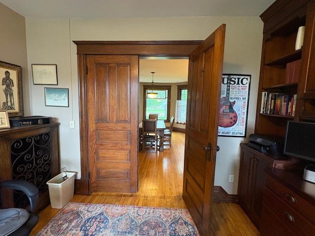 1710 Maple Ave, Benson, MN 56215 - hallway featuring light wood-style floors