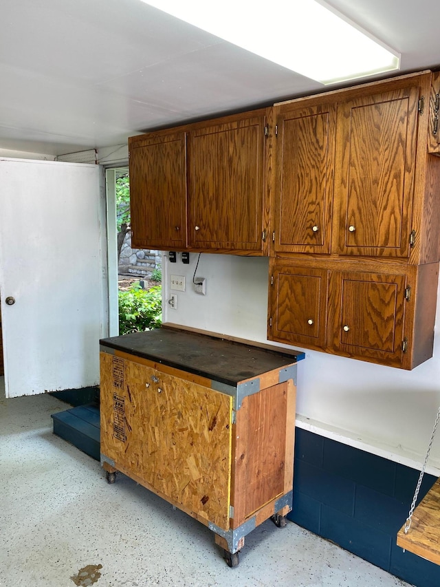 1710 Maple Ave, Benson, MN 56215 - kitchen featuring brown cabinetry