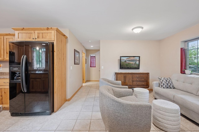 501 Lakeshore Blvd W, Onamia, MN 56359 - living area featuring light tile patterned floors and baseboards