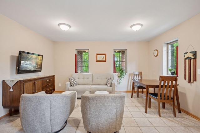 501 Lakeshore Blvd W, Onamia, MN 56359 - living room featuring baseboards and light tile patterned floors