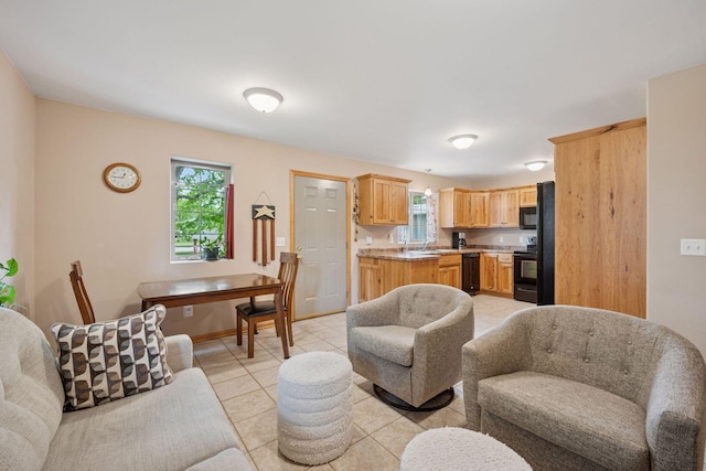 501 Lakeshore Blvd W, Onamia, MN 56359 - living room featuring light tile patterned floors and baseboards