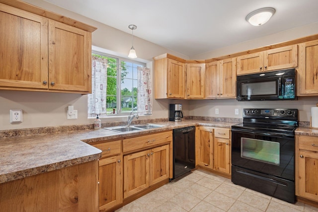 501 Lakeshore Blvd W, Onamia, MN 56359 - kitchen with black appliances, a sink, light tile patterned floors, and pendant lighting