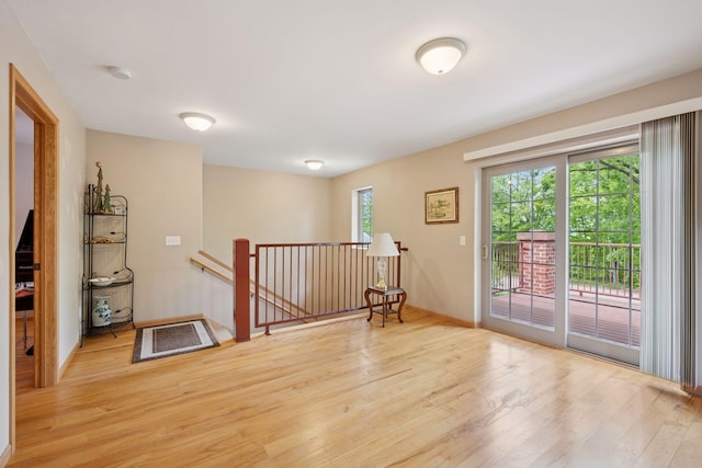 501 Lakeshore Blvd W, Onamia, MN 56359 - empty room with light wood-type flooring and a smoke detector