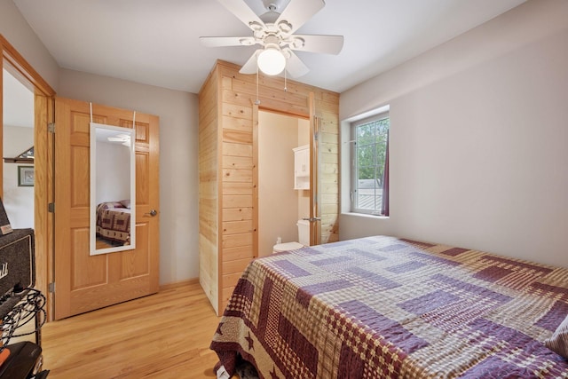 501 Lakeshore Blvd W, Onamia, MN 56359 - bedroom with light wood finished floors and a ceiling fan