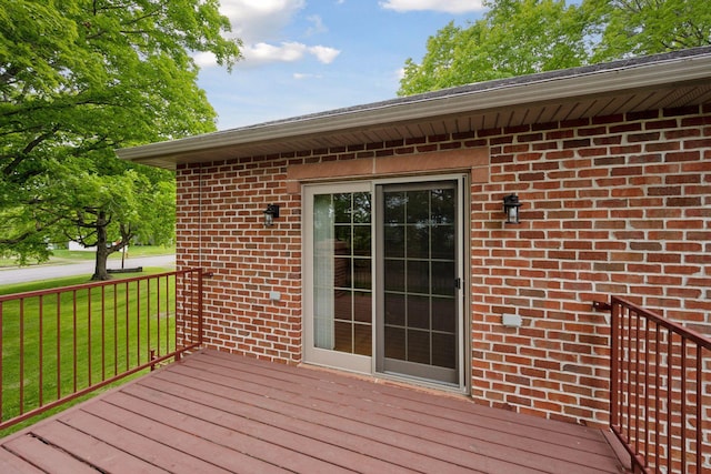 501 Lakeshore Blvd W, Onamia, MN 56359 - wooden deck featuring a lawn