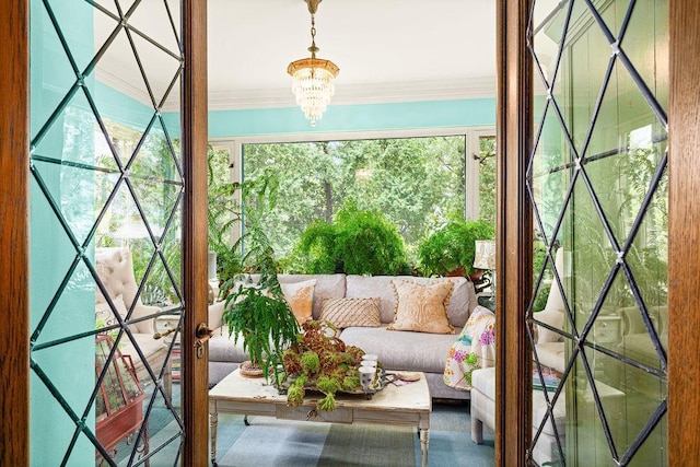 2401 5th St, Duluth, MN 55812 - entryway with ornamental molding and a chandelier