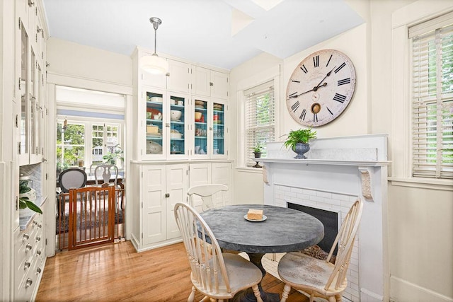 2401 5th St, Duluth, MN 55812 - dining area with light wood finished floors and a fireplace