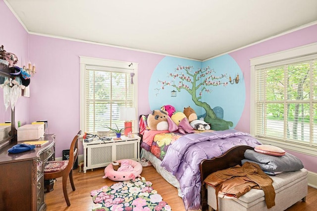 2401 5th St, Duluth, MN 55812 - bedroom featuring ornamental molding and wood finished floors