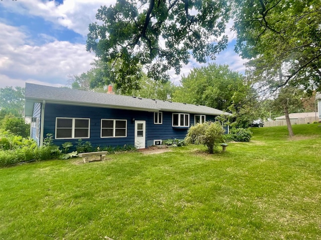1121 Ramsey St W, Stillwater, MN 55082 - rear view of property with a lawn and a chimney