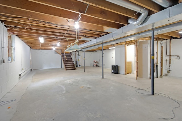 1121 Ramsey St W, Stillwater, MN 55082 - unfinished below grade area featuring stairs and water heater