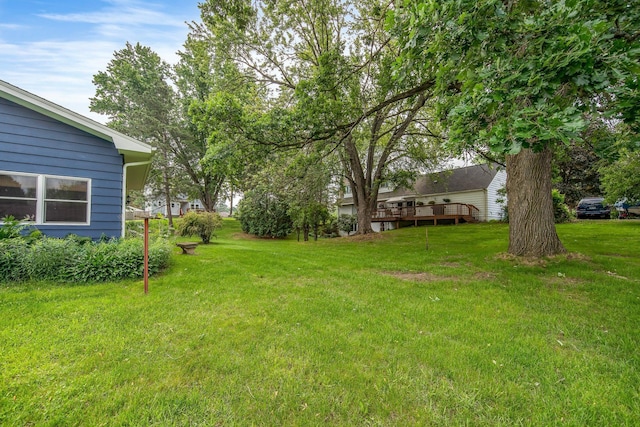 1121 Ramsey St W, Stillwater, MN 55082 - view of green lawn with a wooden deck
