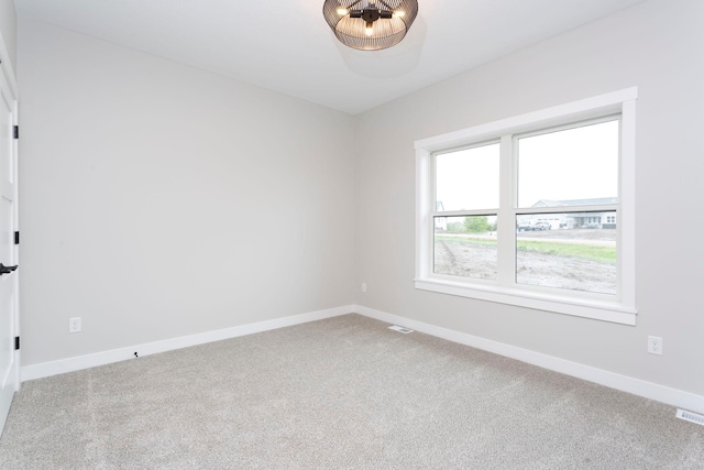 1213 54th St, Saint Joseph Twp, WI 54016 - carpeted spare room with baseboards