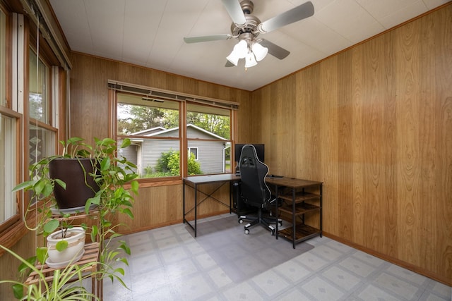 615 Eisenhower Dr, Saint Croix Falls, WI 54024 - home office with light floors, wood walls, a ceiling fan, and baseboards