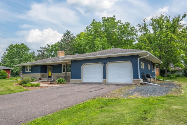 615 Eisenhower Dr, Saint Croix Falls, WI 54024 - ranch-style house featuring an attached garage, driveway, a chimney, and a front lawn