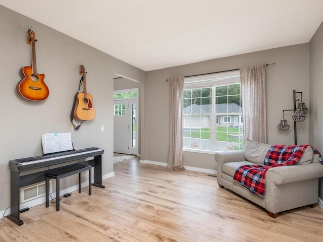 15000 Bridgewater Dr, Savage, MN 55378 - living area featuring light wood-style floors and baseboards