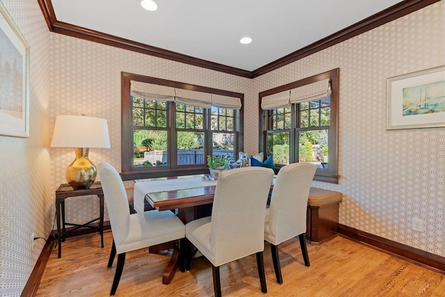 4601 Lake Harriet Pkwy, Minneapolis, MN 55419 - dining space featuring crown molding, light wood-style floors, wallpapered walls, baseboards, and recessed lighting