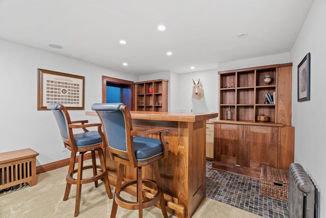 4601 Lake Harriet Pkwy, Minneapolis, MN 55419 - indoor dry bar featuring radiator heating unit, recessed lighting, carpet flooring, and baseboards
