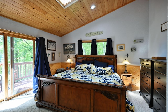 1147 Hillside Ln, Edgewater, WI 54817 - carpeted bedroom with access to outside, vaulted ceiling, wainscoting, wood ceiling, and wood walls