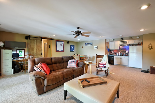 1147 Hillside Ln, Edgewater, WI 54817 - living area with light colored carpet, a dry bar, a barn door, recessed lighting, and an office area