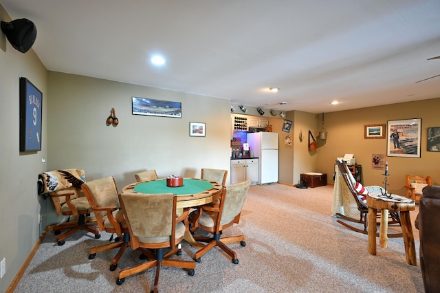 1147 Hillside Ln, Edgewater, WI 54817 - dining space featuring light colored carpet, baseboards, and recessed lighting