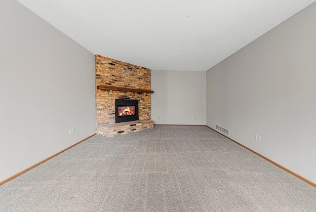 5214 148th St W, Apple Valley, MN 55124 - unfurnished living room with carpet floors and a brick fireplace