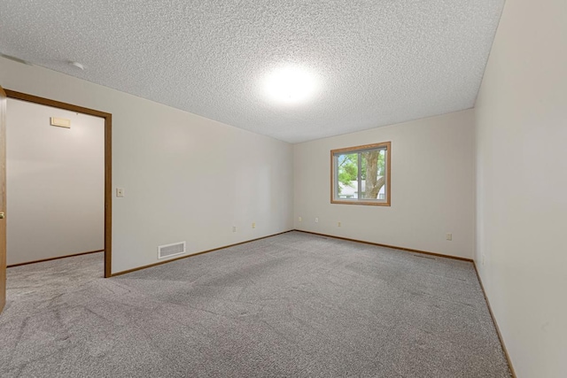 5214 148th St W, Apple Valley, MN 55124 - spare room featuring a textured ceiling and carpet