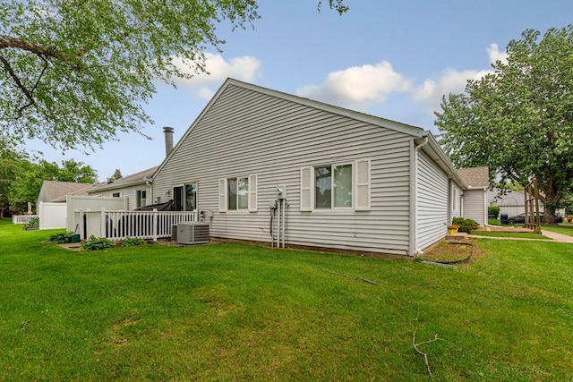 5214 148th St W, Apple Valley, MN 55124 - rear view of house with a lawn and a deck