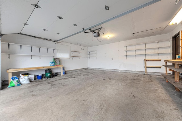 5214 148th St W, Apple Valley, MN 55124 - garage with a garage door opener and baseboards