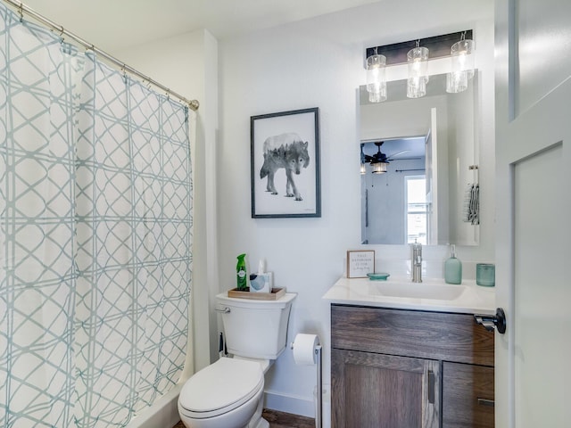 2855 28 11/16 St, Cedar Lake Twp, WI 54817 - bathroom featuring vanity, toilet, a shower with curtain, and a ceiling fan