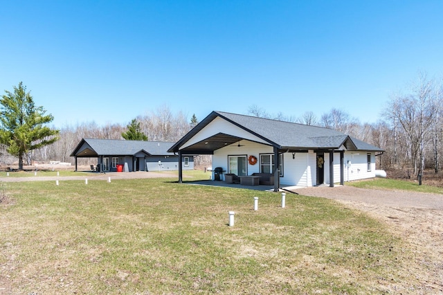 2855 28 11/16 St, Cedar Lake Twp, WI 54817 - view of front of property featuring a front yard, dirt driveway, and roof with shingles