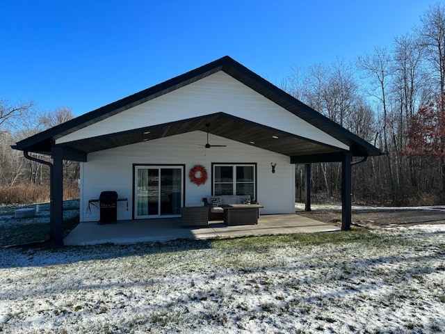2855 28 11/16 St, Cedar Lake Twp, WI 54817 - back of house with a ceiling fan, a patio, and an outdoor hangout area