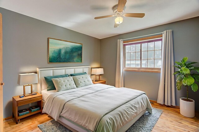 407 4th Ave NE, Kasson, MN 55944 - bedroom with light wood finished floors and a ceiling fan