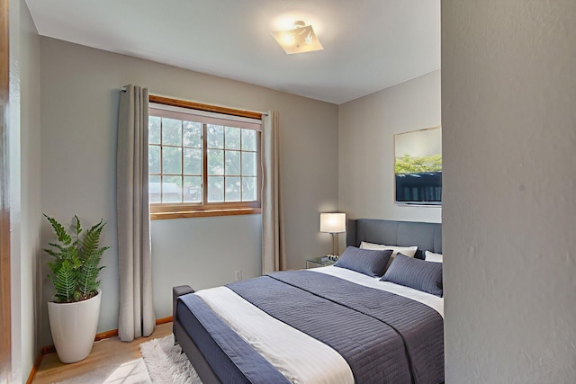 407 4th Ave NE, Kasson, MN 55944 - bedroom featuring baseboards