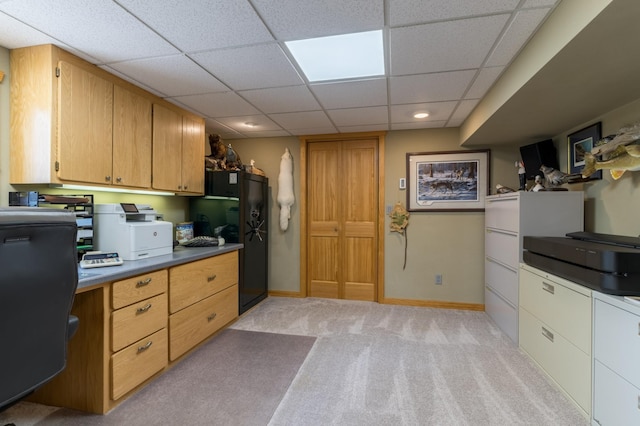 27766 County 37, Laporte, MN 56461 - kitchen with a drop ceiling, light carpet, baseboards, dark countertops, and a desk