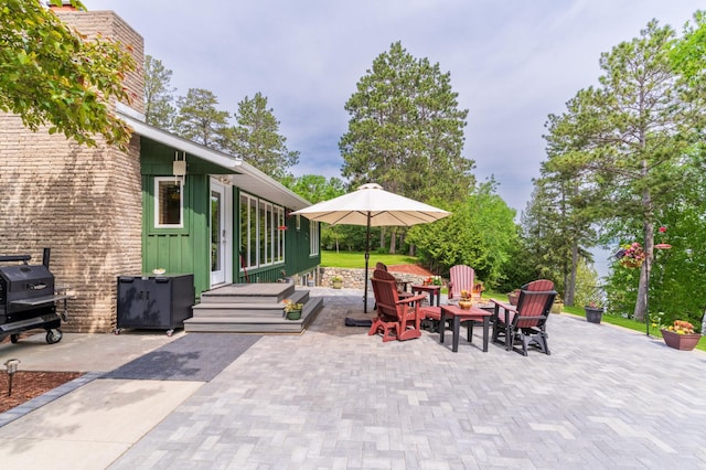 27766 County 37, Laporte, MN 56461 - view of patio / terrace featuring a fire pit and area for grilling