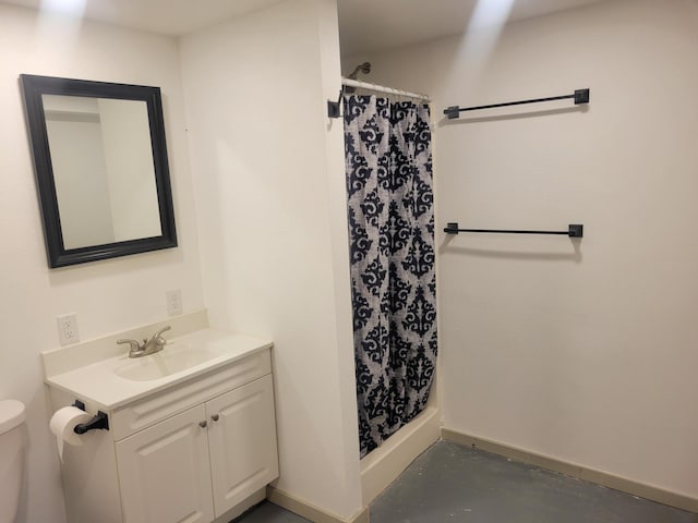 1981 Long Lake Ln, Johnstown Twp, WI 54826 - bathroom with toilet, vanity, a shower with shower curtain, and baseboards