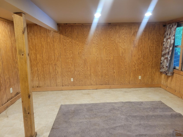 1981 Long Lake Ln, Johnstown Twp, WI 54826 - spare room with wood walls and tile patterned floors