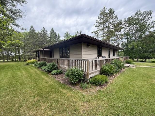 20501 Nebish Rd NE, Blackduck, MN 56630 - view of home's exterior featuring a yard and a deck