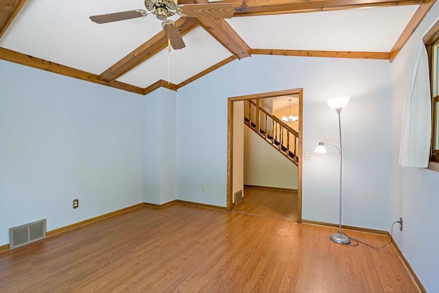 11606 235th St E, Lakeville, MN 55044 - spare room with wood finished floors, a ceiling fan, baseboards, and stairway