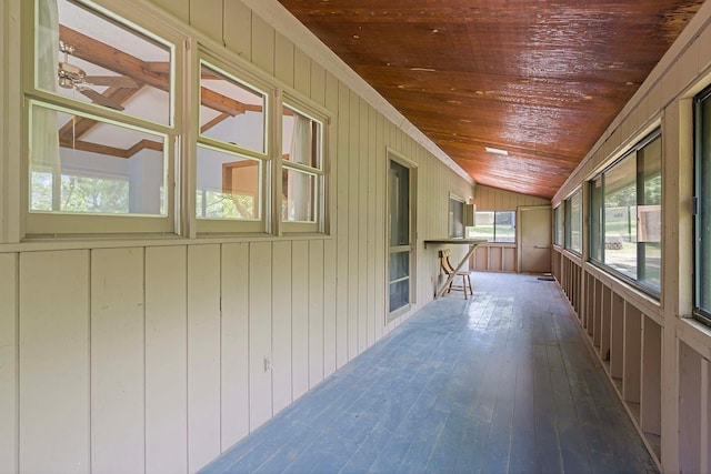 11606 235th St E, Lakeville, MN 55044 - unfurnished sunroom featuring wood ceiling, lofted ceiling, wood-type flooring, and wooden walls