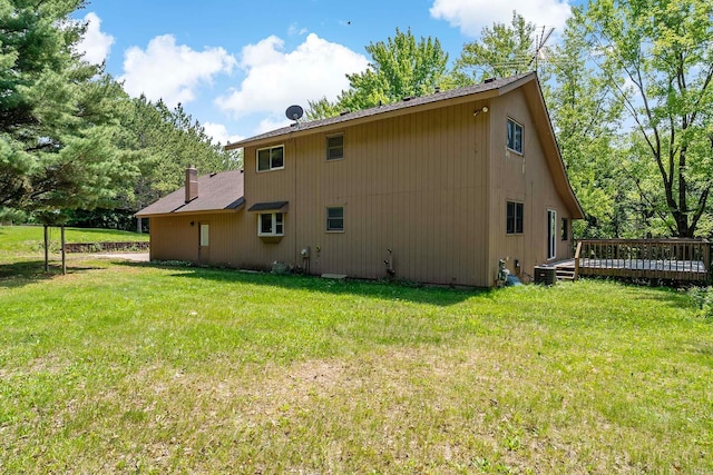 11606 235th St E, Lakeville, MN 55044 - back of house featuring a wooden deck and a lawn